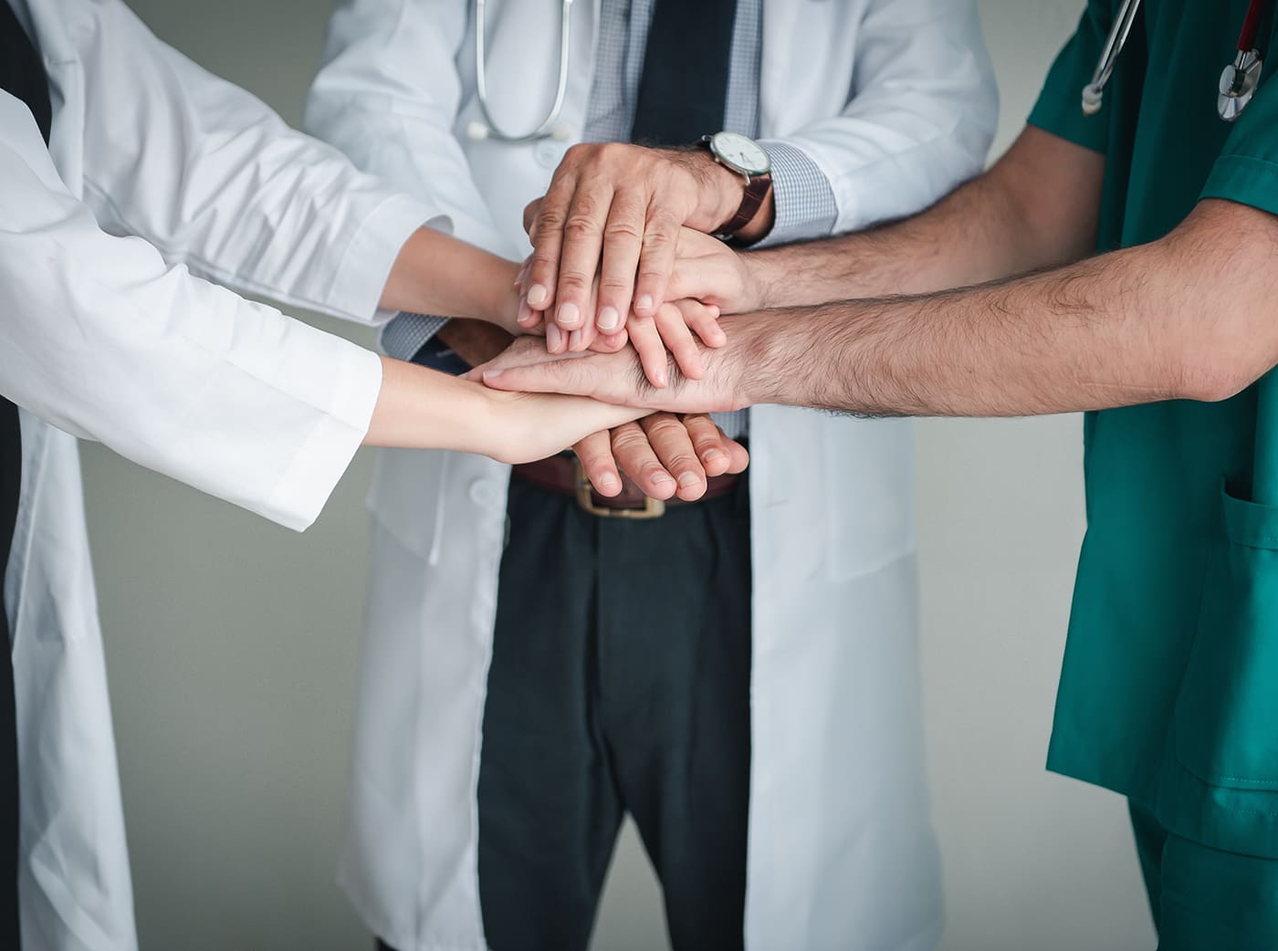 Medical Dentist Team Stacking Their Hands Together