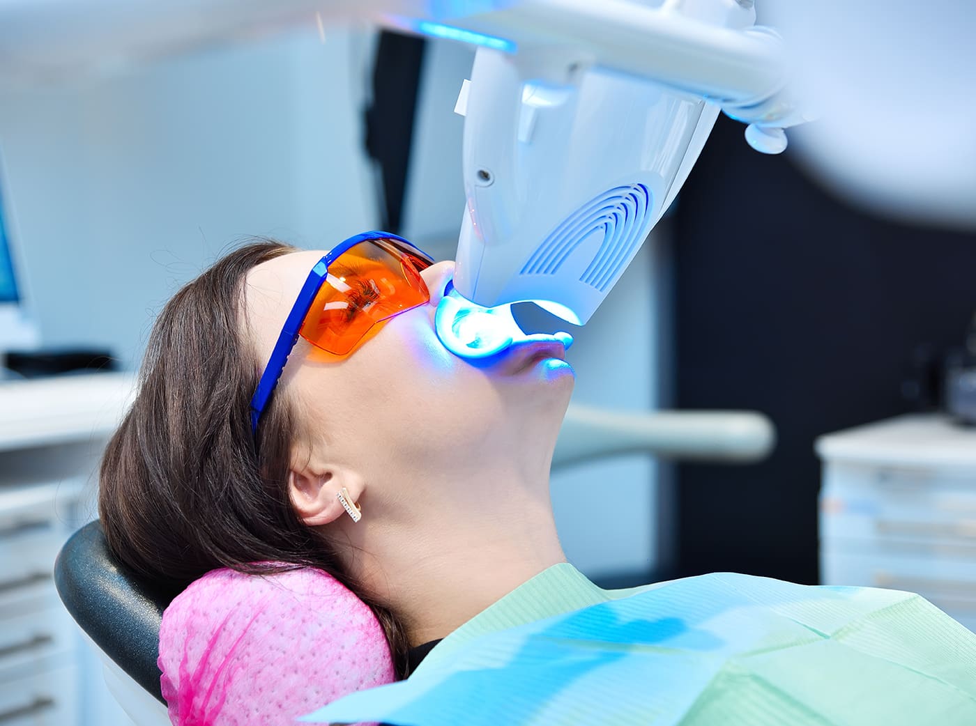 Teeth whitening for patient in protective glasses in london ontario