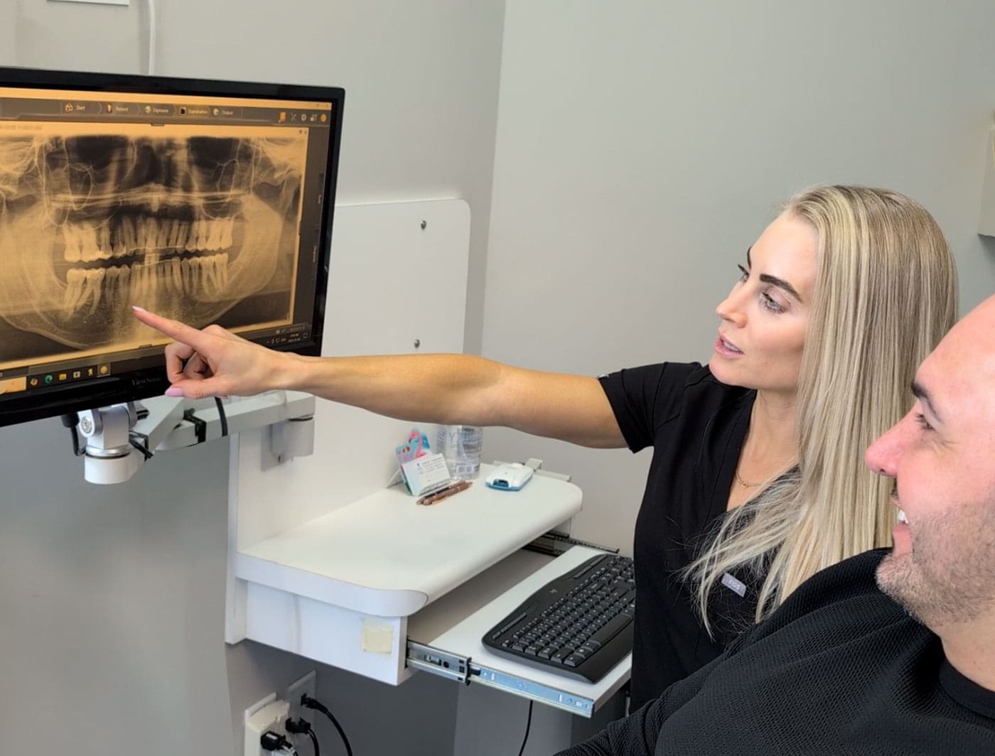 General dentist reviewing xrays in london ontario