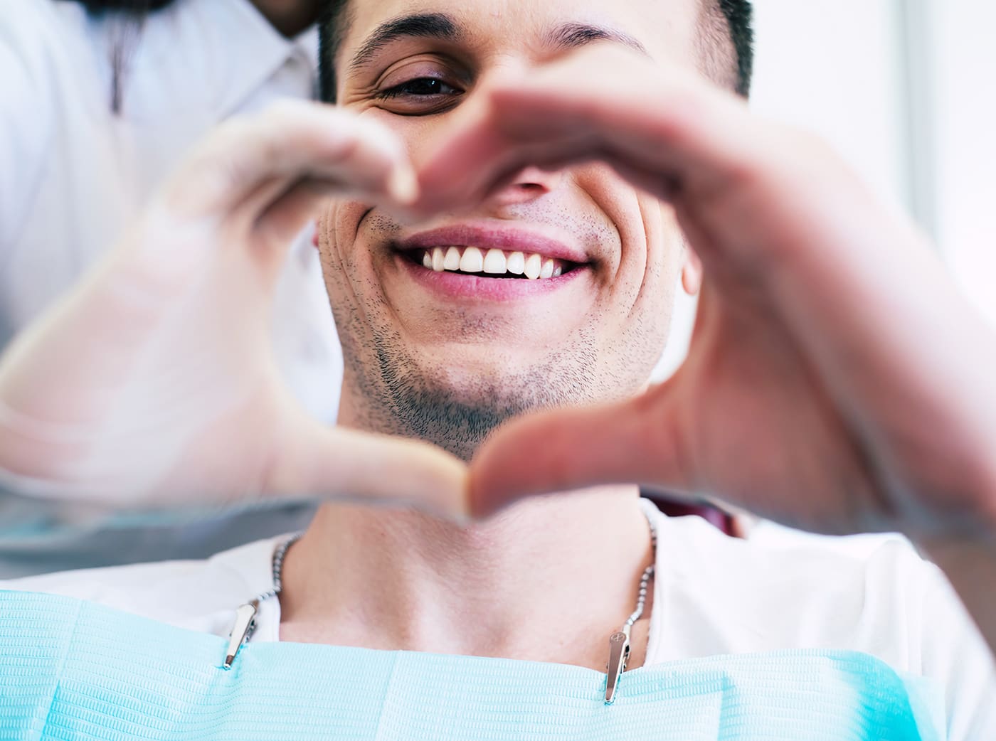 patient with white and healthy smile