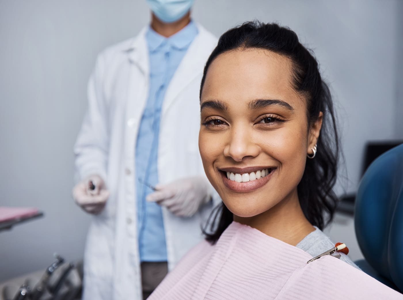 young woman having dental work done on her teeth by a dentist in london ontario